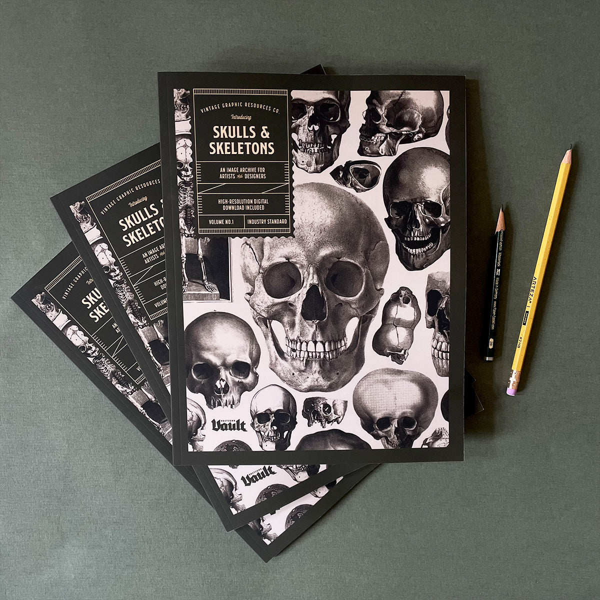 Notebook with skull design on a gray background